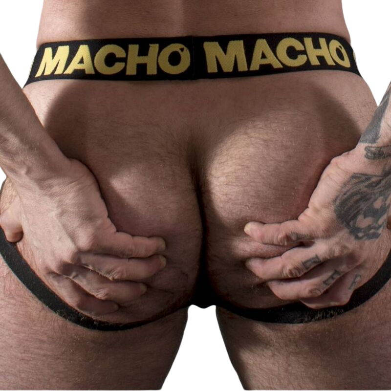 Detalhe do MACHO Cinto Jock MX25AC em couro sintético amarelo, realçando o design sensual e o material elástico.