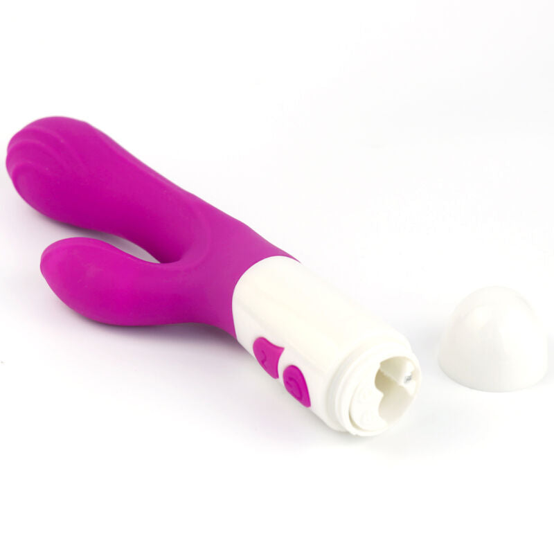 Close-up do Armony Vibrador Happy e Estimulador Violeta, destacando seu design ergonômico e textura de silicone macio.