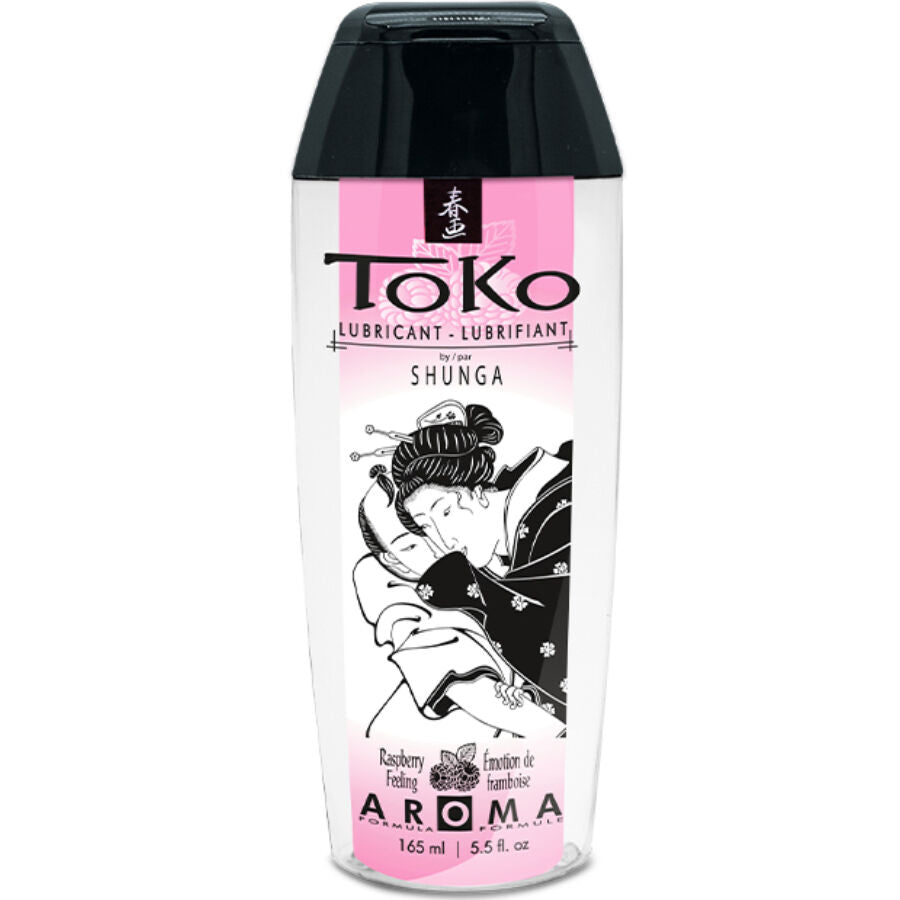 Close-up do SHUNGA Lubrificante Íntimo Comestível Sabor Framboesa Toko Aroma 165ml, destacando a embalagem e a cor do produto.