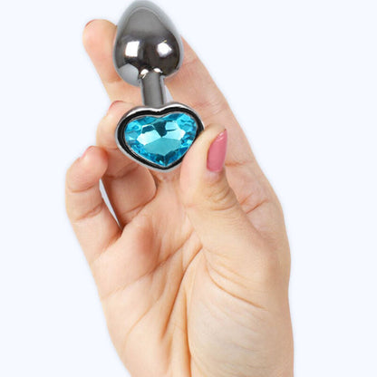 SECRETPLAY Plug Anal de Metal Coração Azul Pequeno 7cm, mostrando detalhes do design e material metálico.