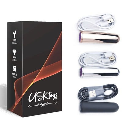 Close-up da Bala Vibrador ARMONY Dourado, destacando seu design compacto e elegante.