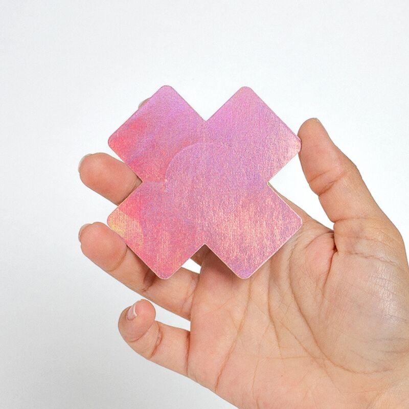 Close-up of SECRET PLAY Protetores de Mamilo Cruz Holográfica, 2 Pares, showing the black and pink designs.