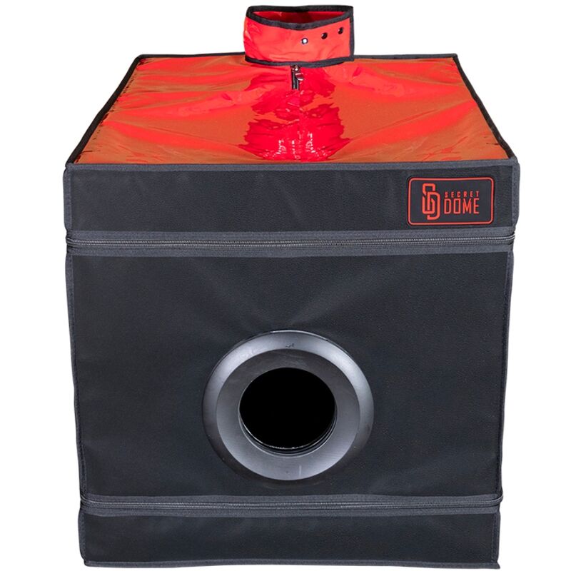 Cabine BDSM Secret Dome Kink Club La Niche em preto e vermelho para experiências de contenção.