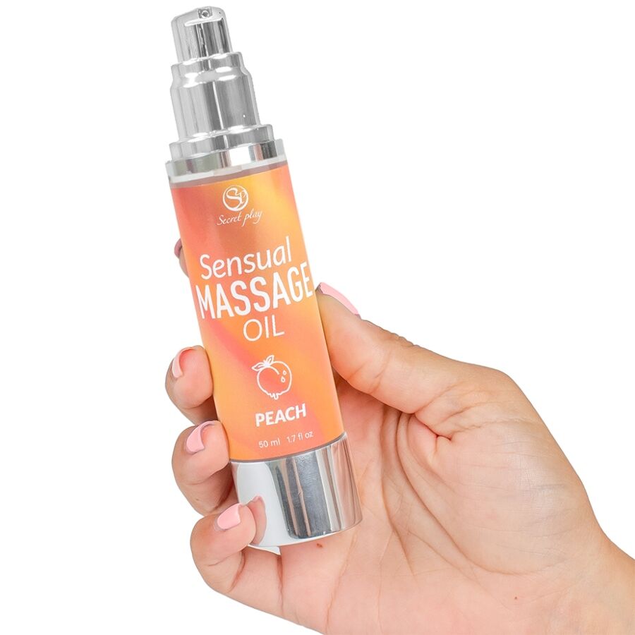 Close-up do Óleo de Massagem de Pêssego SecretPlay 50ml, mostrando a embalagem e a textura do produto.