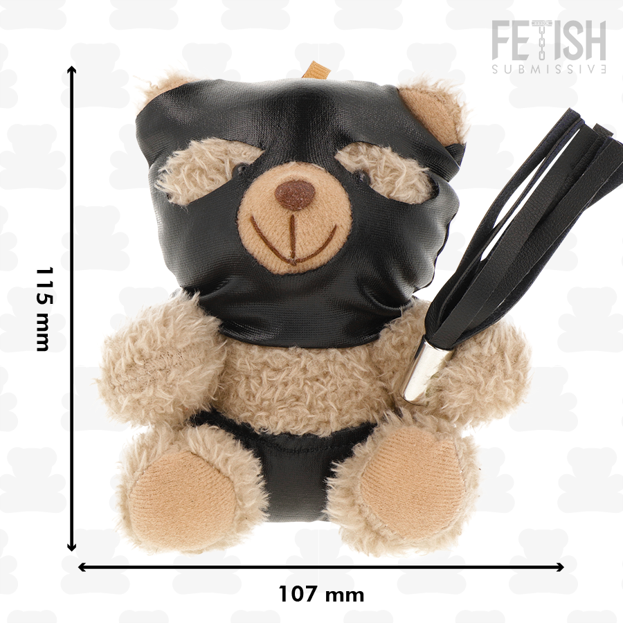 Urso de Pelúcia BDSM Luno da FETISH SUBMISSIVE com máscara preta e chicote, detalhes de arreios e correntes.